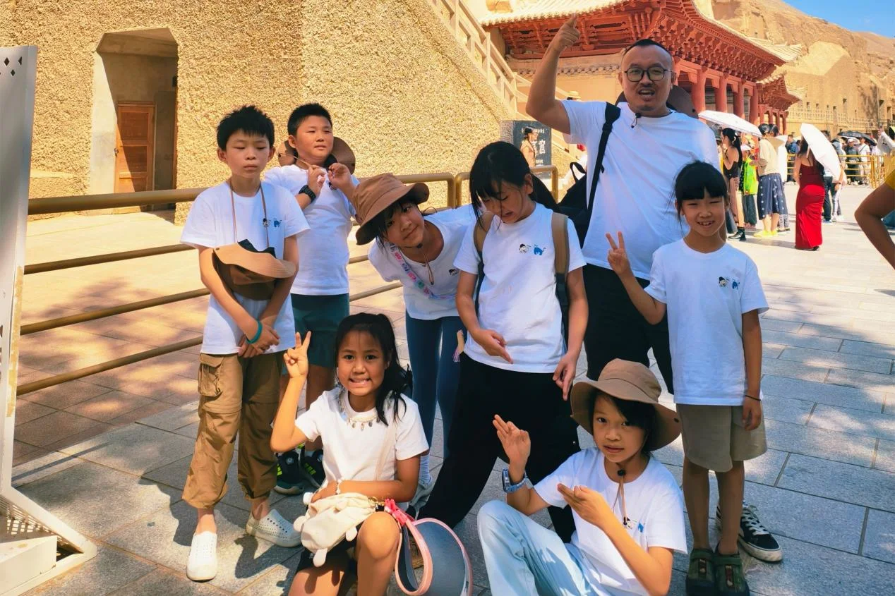 Students visiting the Mogao Caves