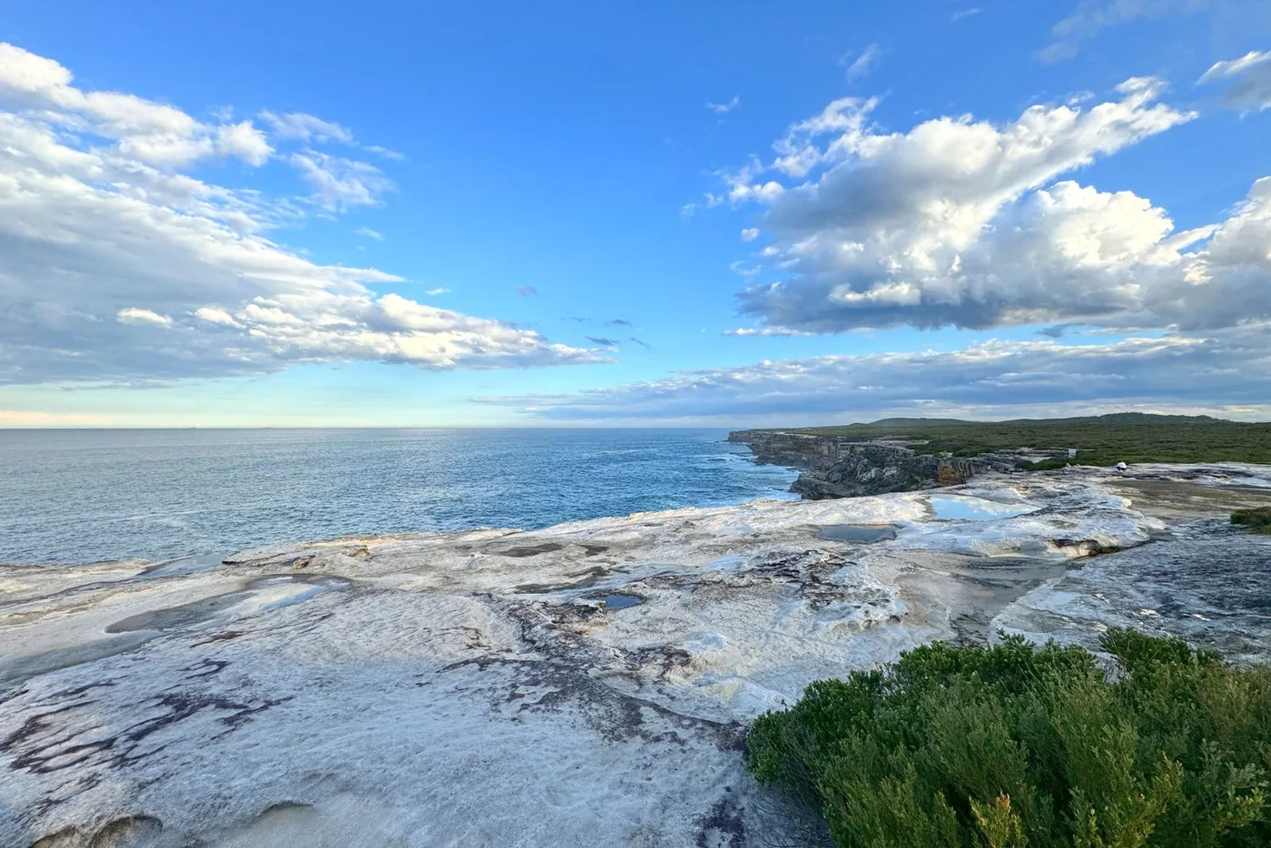 Sydney coastline under a vibrant blue sky