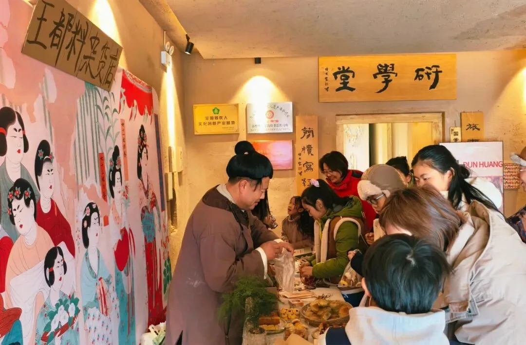 Robed vendor serving queuing children at a bazaar stall below a carved wooden signboard